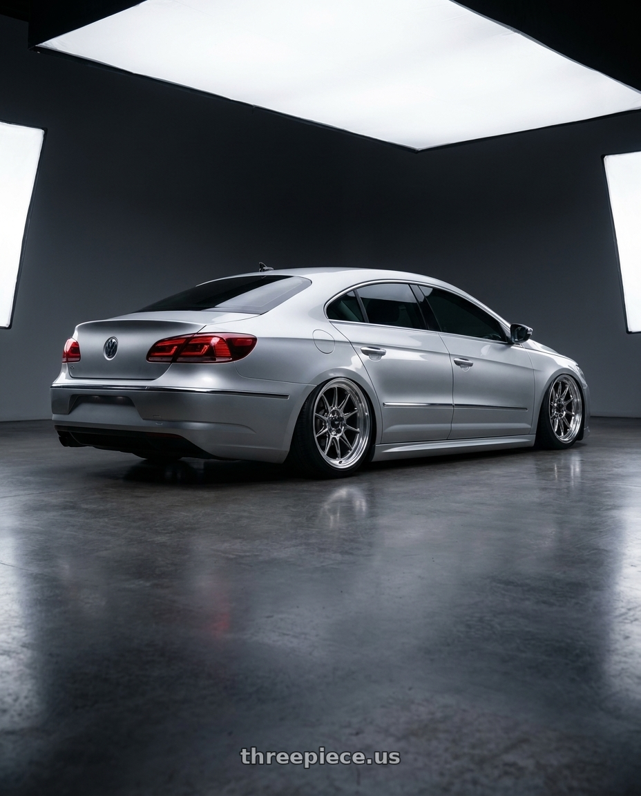 2015 Volkswagen CC with Konig Countergram 5x112 19x11+40 Hyper Chrome / Machined Lip wheels rear three quarter view slight stretch tires
