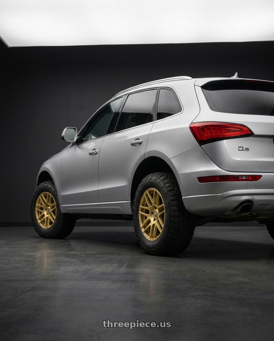 2014 Audi Q5 with Forgestar F14C 5x112 18x8.5 +38 Gold wheels rear three quarter view meaty tires