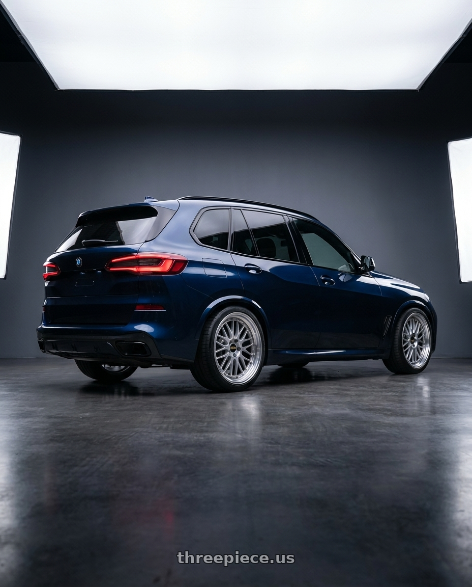 2019 bmw x5 with BBS LM 5x112 21x10.0+40 Diamond Silver wheels rear three quarter view square tires