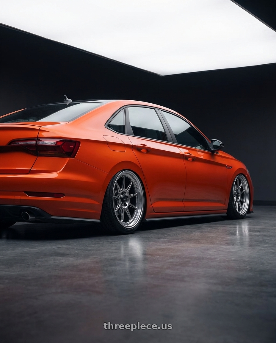 2023 Volkswagen Jetta GLI MK7 with Konig Countergram 5x112 19x11+40 Hyper Chrome / Machined Lip wheels rear three quarter view slight stretch tires