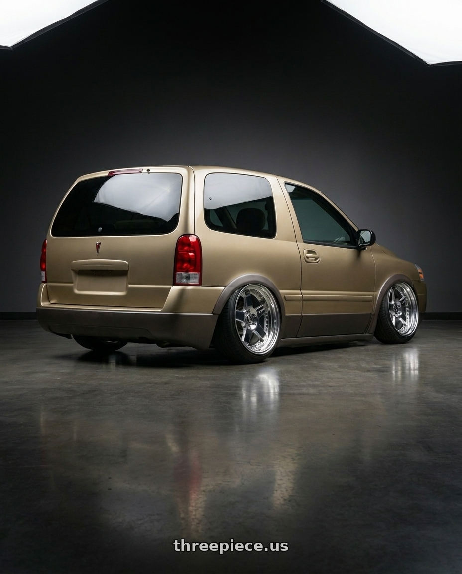 2009 pontiac montana sv6 custom stubby with DUB 1PC S115 BALLER 5X114.3 22X8.5 +38 CHROME PLATED wheels rear three quarter view extreme stretch tires