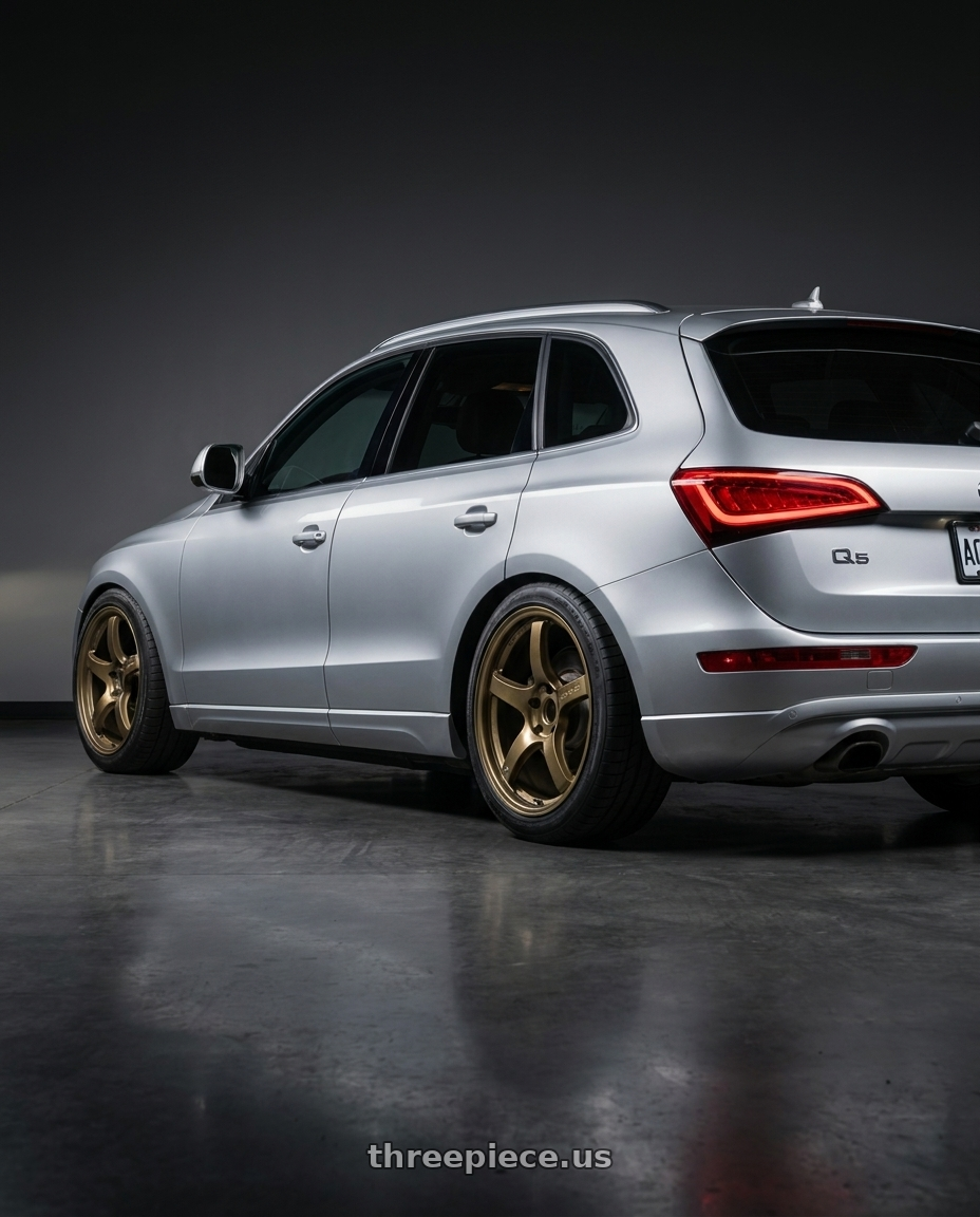 2013 AUDI Q5 with Gram Lights 57CR 5x114.3 18x9.5 +38 Almite Gold wheels rear three quarter view square tires