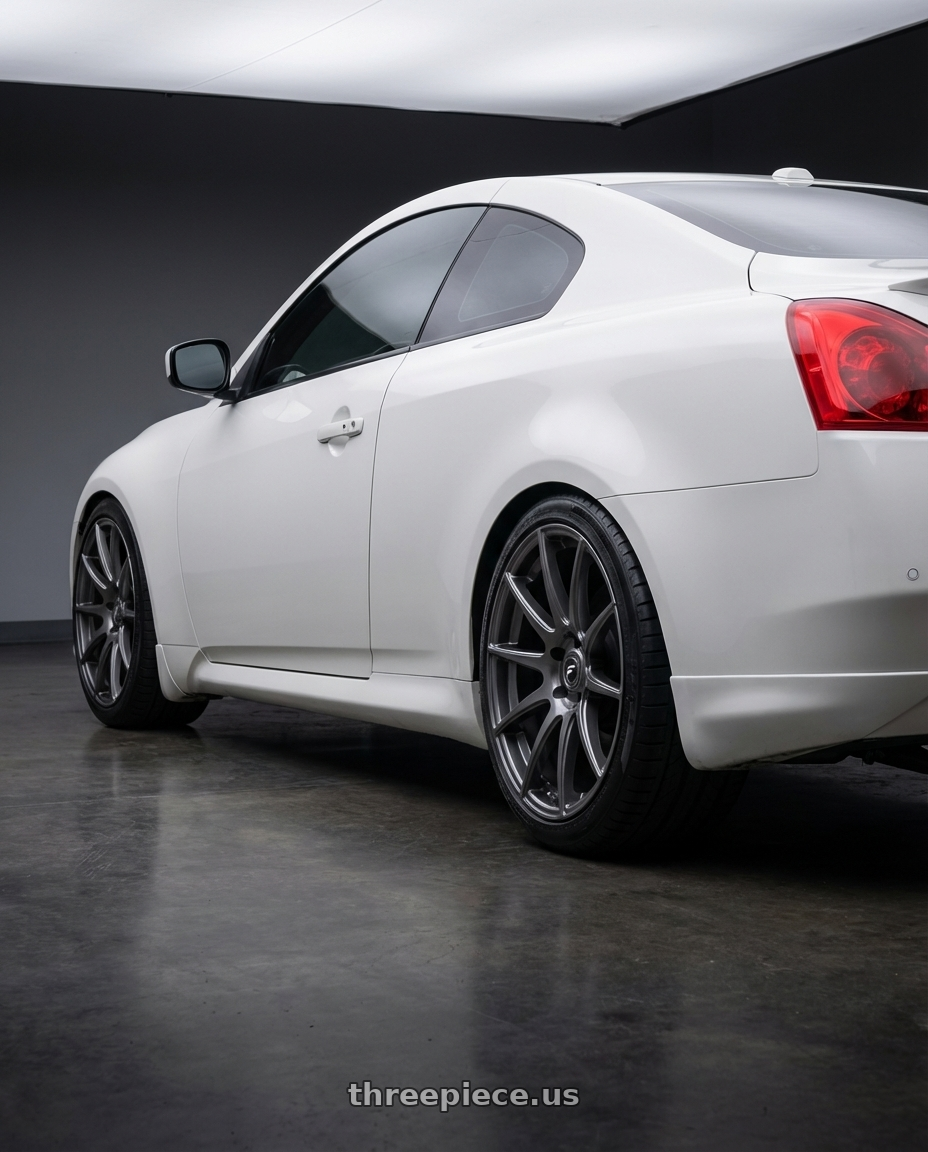 2014 Infiniti G37 Coupe with Forgestar CF10 5x114.3 19x9 +35 Gloss Anthracite wheels rear three quarter view square tires