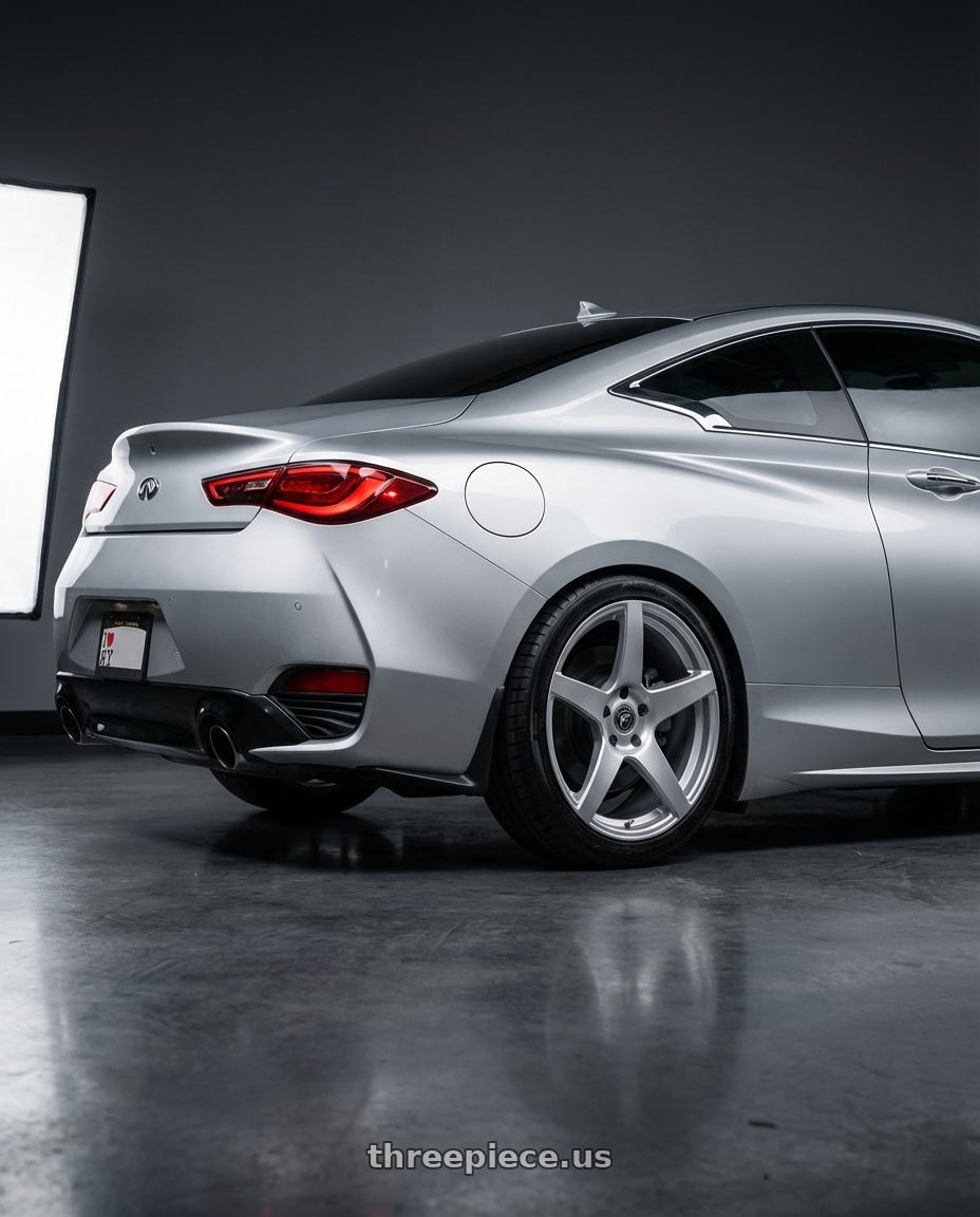 2020 Infiniti Q60 with Forgestar CF5 5x114.3 19x9.5 +29 Gloss Silver wheels rear three quarter view square tires