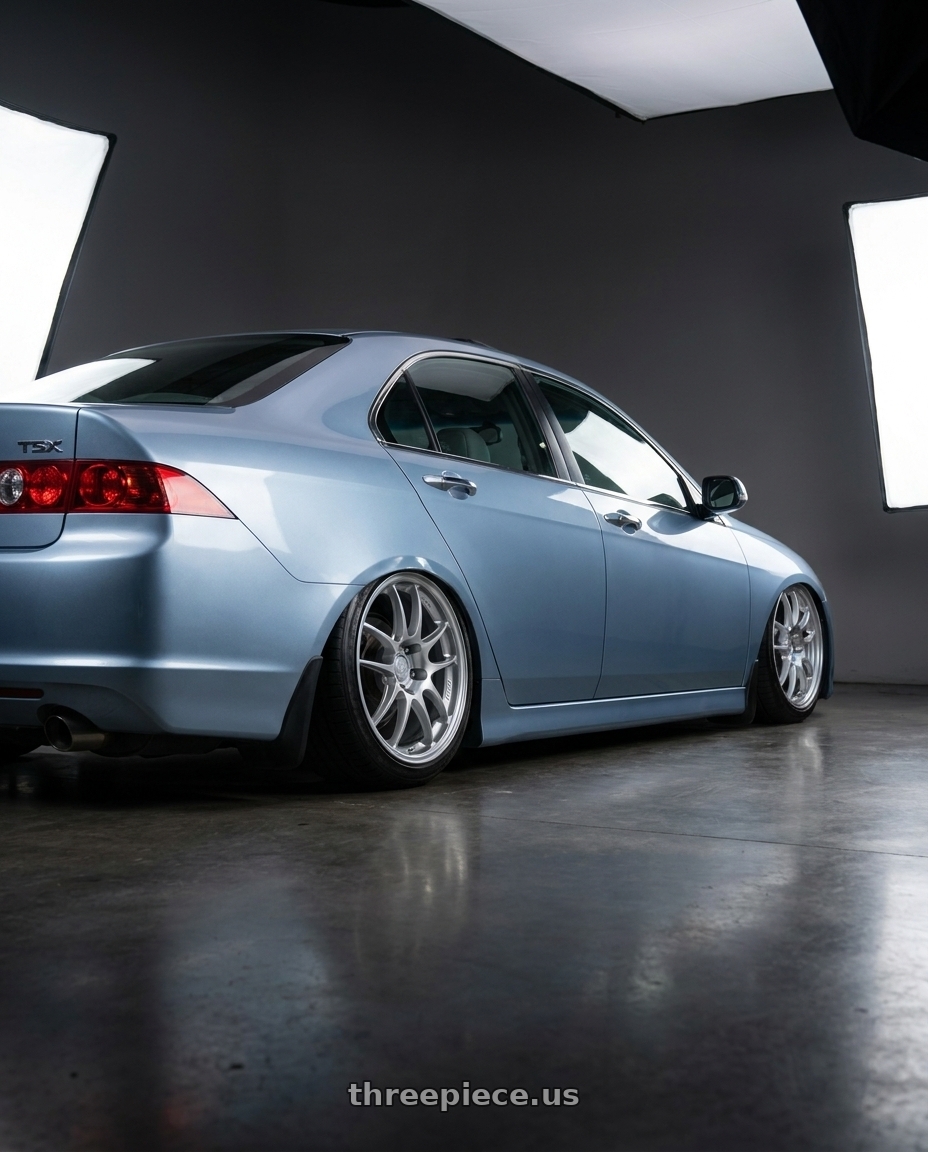 2005 Acura Tsx with Enkei PF01 5x114.3 17x8+50 Silver wheels rear three quarter view slight stretch tires