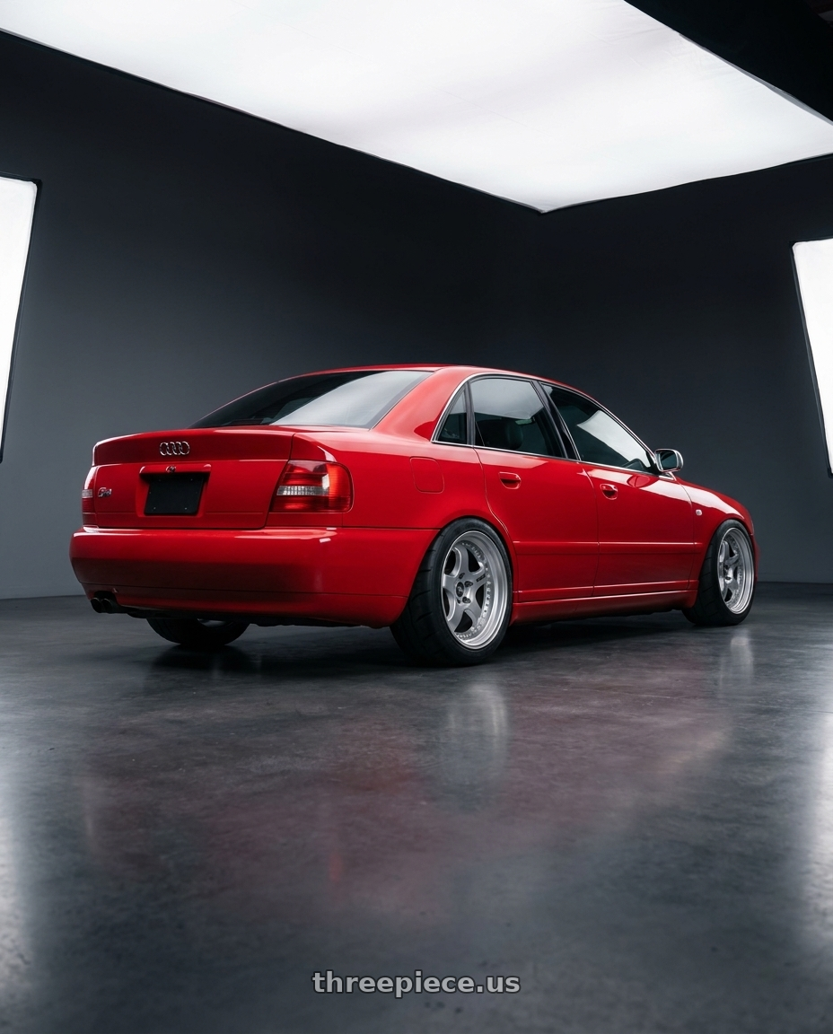 2000 Audi s4 laser red with Work Meister L1 3P 5x112 18x8.5+33 O Disk Matte Silver wheels rear three quarter view meaty tires