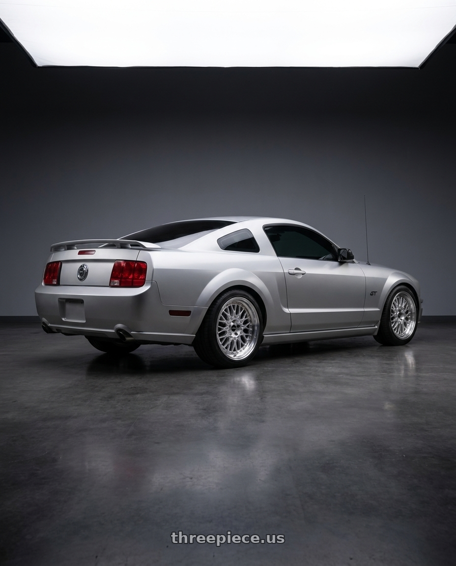 2006 Ford Mustang GT Satin with ARC AR1 5x114.3 17x8.5  +35 Silver Machine Face Lip Chrome Rivet wheels rear three quarter view square tires