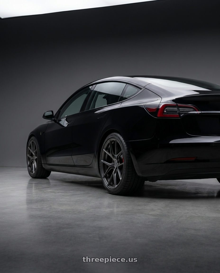 2019 tesla model 3 performance black with Avant Garde Wheels M580R 5X120 20x9 +38 Dark Graphite Metallic wheels rear three quarter view square tires