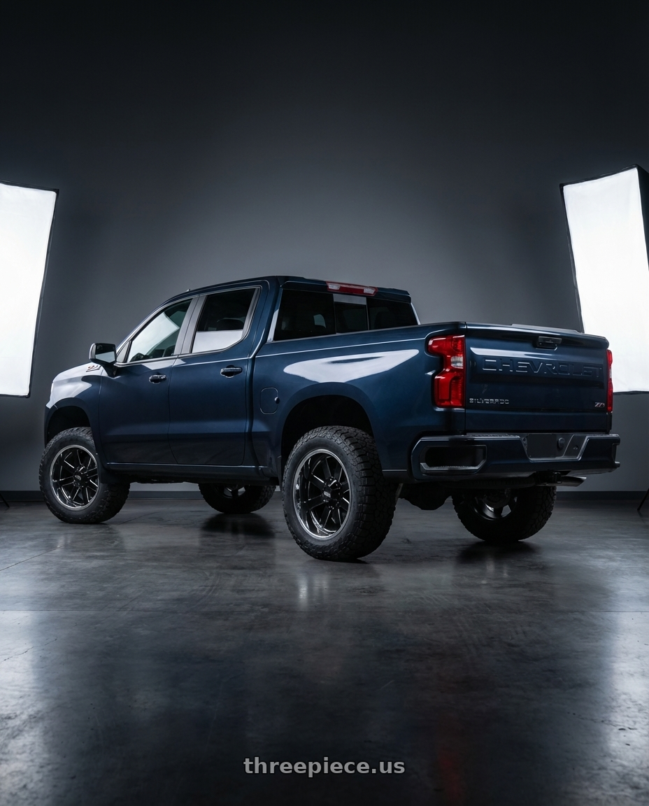 2023 Chevrolet Silverado 1500 with Moto Metal MO200 6X139.7 20X12 -44 GLOSS BLACK MILLED CENTER CHROME LIP wheels rear three quarter view meaty tires