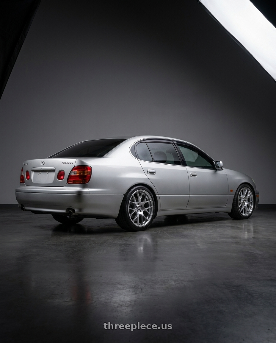 2001 Lexus GS300 with Enkei Raijin 5x114.3 18x9.5+35 Hyper Silver wheels rear three quarter view square tires
