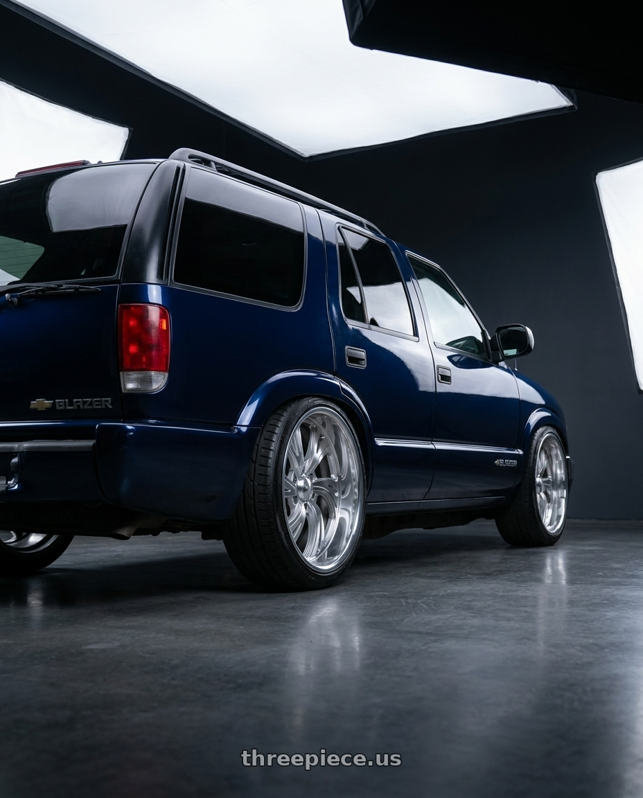 1999 Chevrolet s10 blazer  with Dropstars 658SL 6X135 22x11 +40 - wheels rear three quarter view slight stretch tires