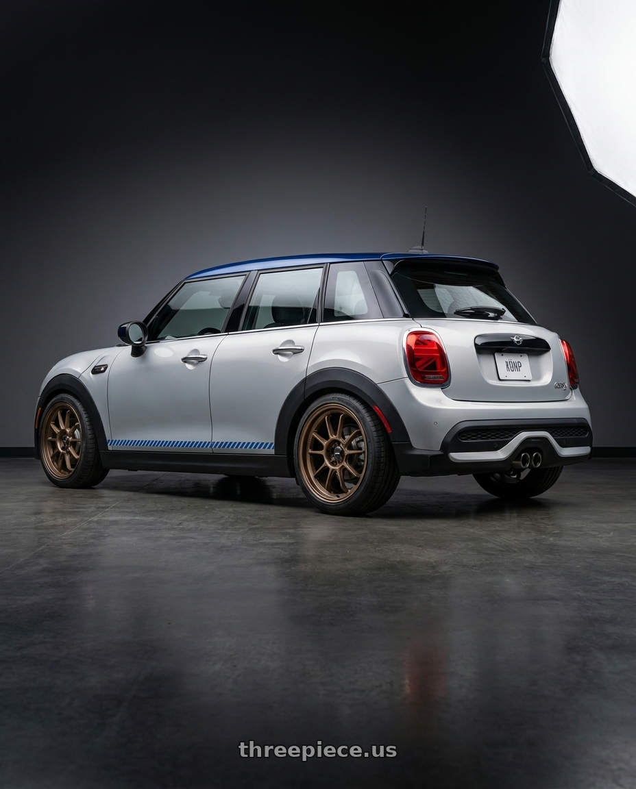 2022 mini cooper s with Konig Hypergram 5x112 17x8+45 Race Bronze wheels rear three quarter view square tires