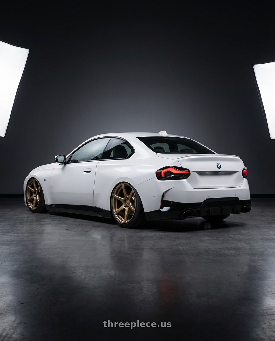 2024 BMW 2 Series G42 with Kansei K11B Tandem 5X112 19x9.5 22 Bronze wheels rear three quarter view slight stretch tires