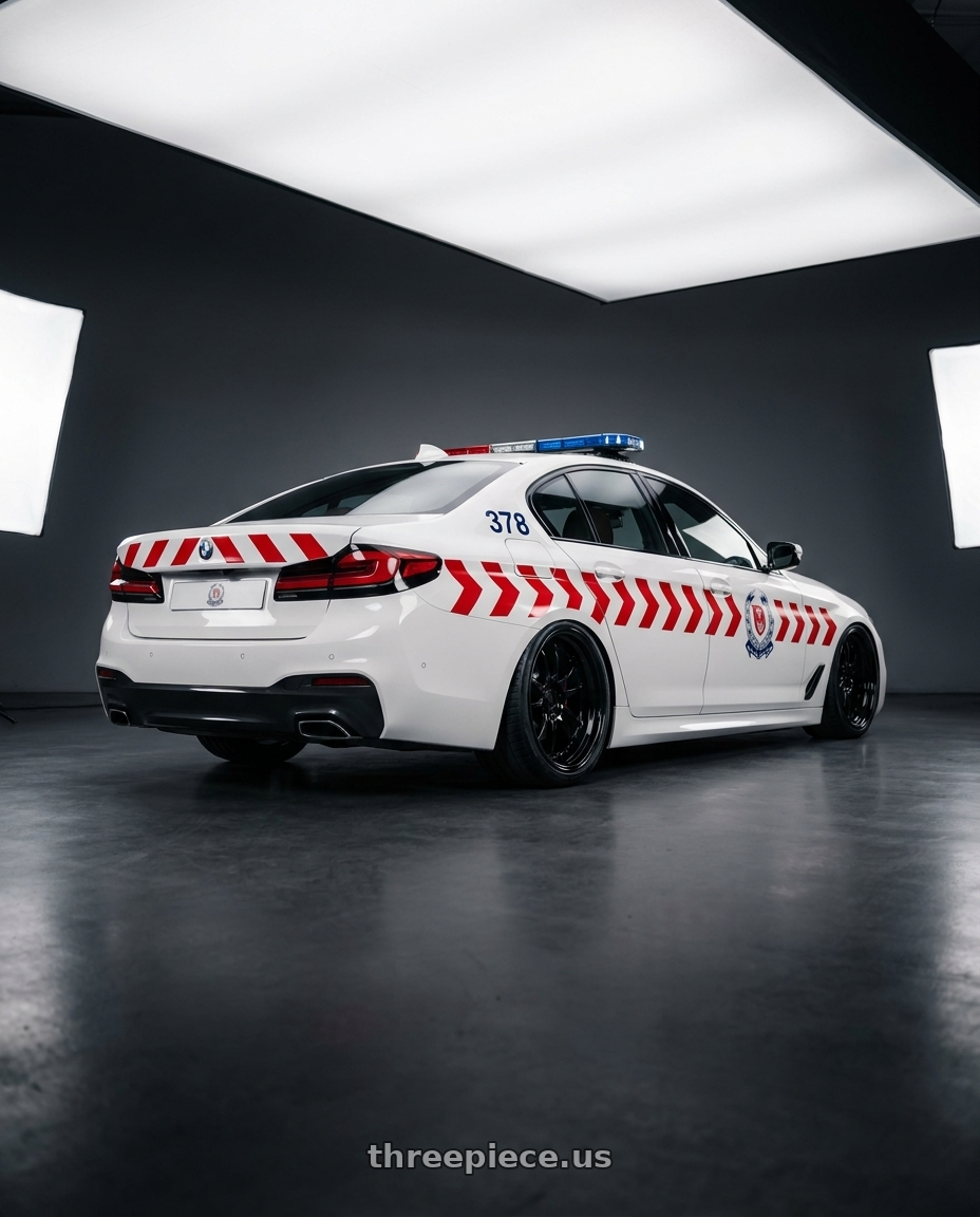 2021 bmw 5-series sedan 520i m sport (台灣國道紅斑馬) with E5 Wheels Daytona 5x120.65 20x12+50 BK wheels rear three quarter view slight stretch tires