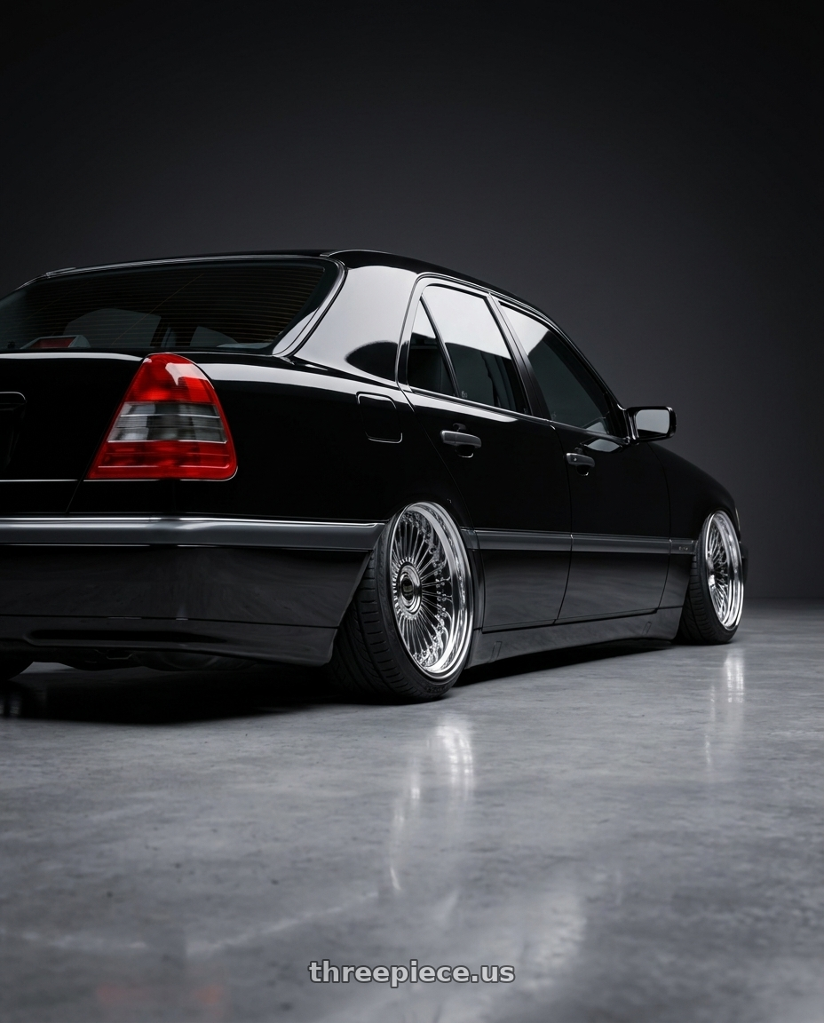 1996 mercedes-benz c280 base black with Work Emitz Black Polish 5x100 19x7.5 +38 wheels rear three quarter view extreme stretch tires