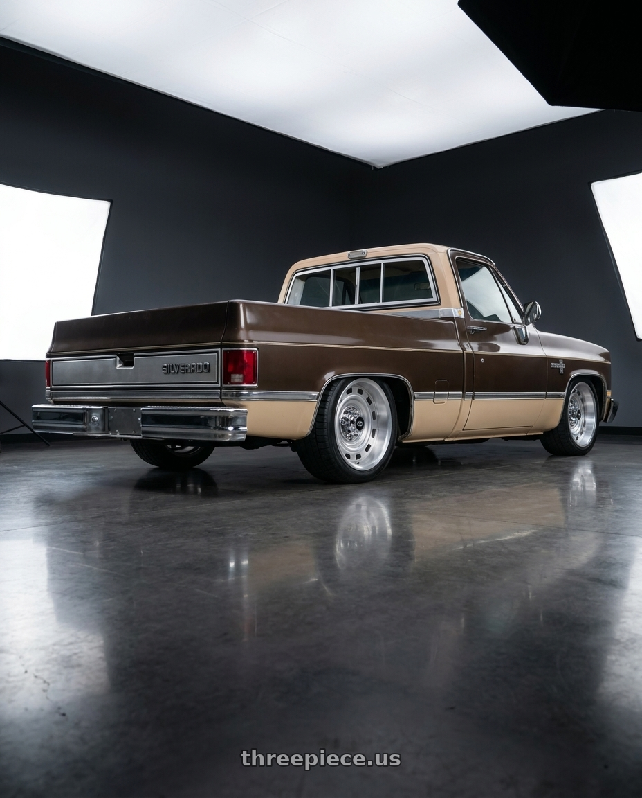1984 Chevy C10 with Vision American Muscle 54 Cheyenne 6x139.7 22x9+25 wheels rear three quarter view square tires
