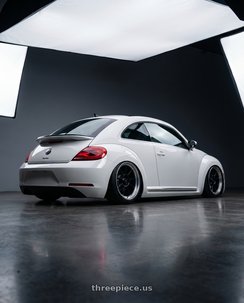 2016 Volkswagen Beetle Turbo with Konig Countergram 5x112 19x11+40 Matte Black / Matte Machined Lip wheels rear three quarter view slight stretch tires
