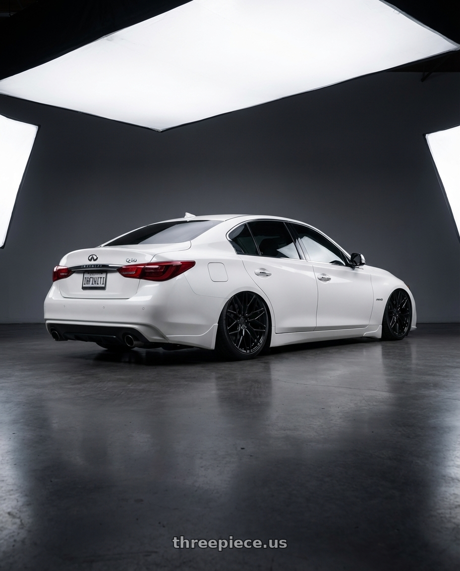 2020 Infiniti Q50 with Avant Garde Wheels M520R 5X114.3 20x10 +35 Gloss Black wheels rear three quarter view slight stretch tires