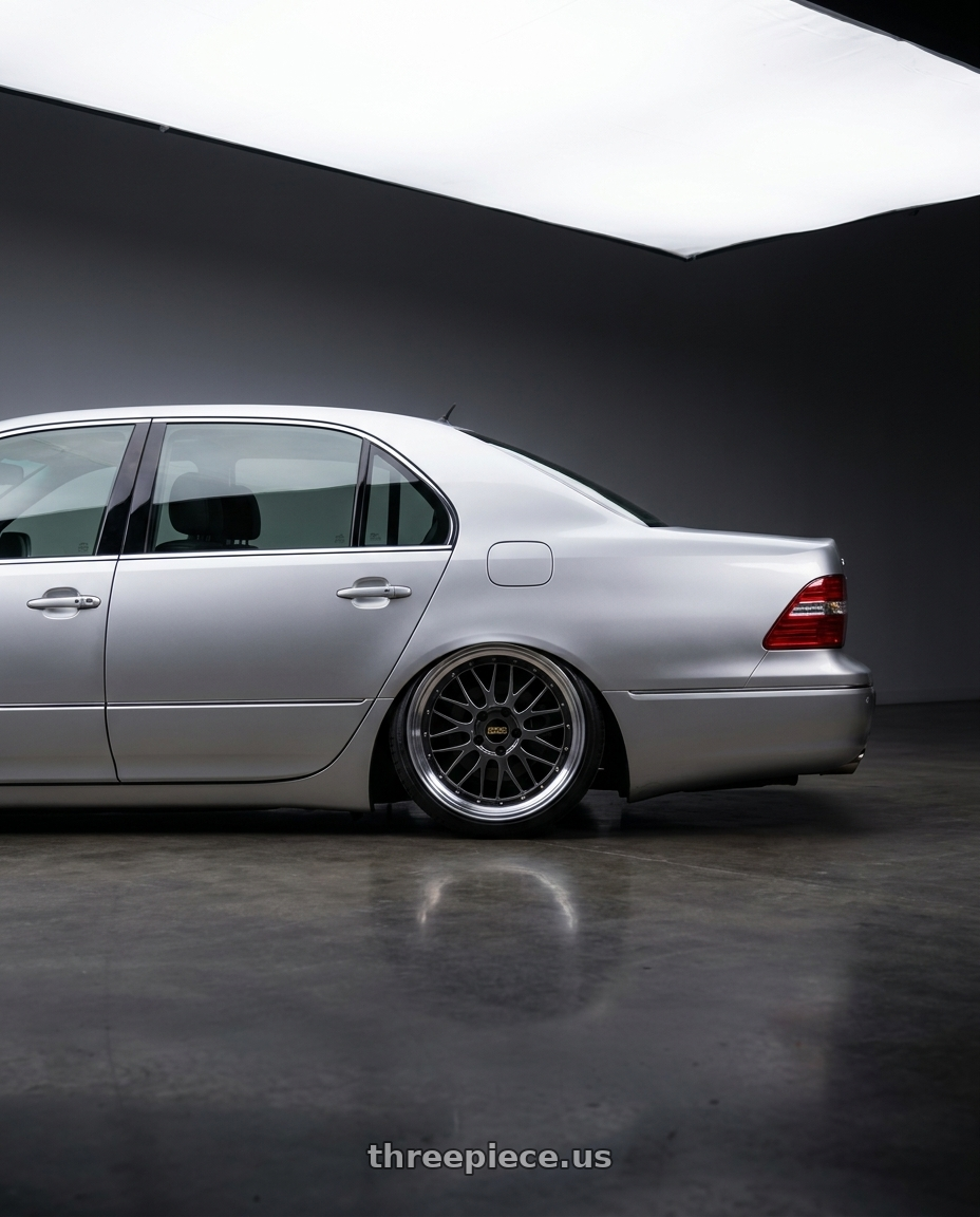 2005 Lexus LS430 with BBS LM 5x114.3 18x9.0+42 Diamond Black wheels rear three quarter view slight stretch tires
