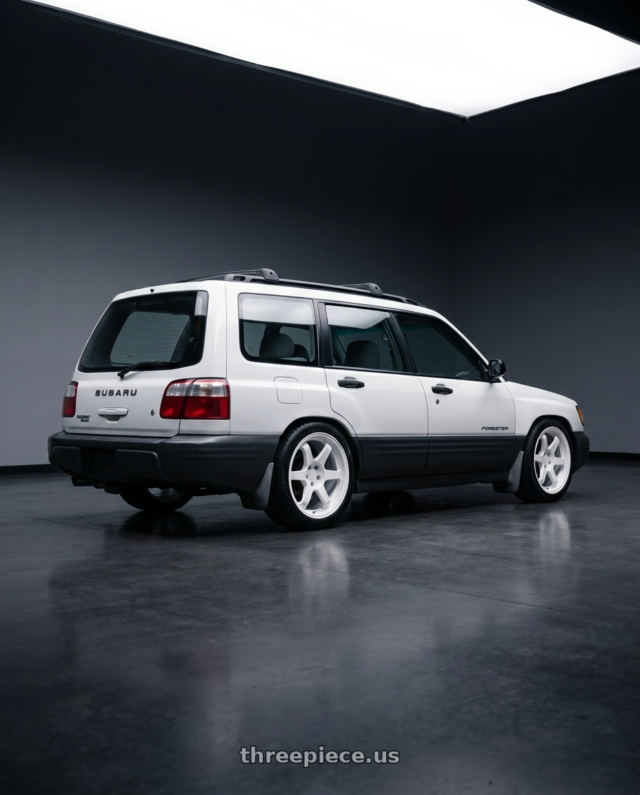 2001 Subaru forester L with 9six9 SIX-1 5x100 17X8 +35 Competition White wheels rear three quarter view square tires