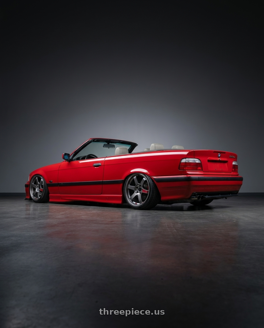 1995 BMW 325ic with Volk Racing TE37 SAGA SL 5x120 18x9 +23 PRESSED GRAPHITE wheels rear three quarter view slight stretch tires