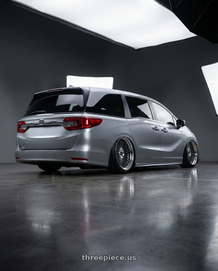 2024 Honda Odyssey with Work Emitz Black Polish 5x120 20x8.0 +45 wheels rear three quarter view extreme stretch tires