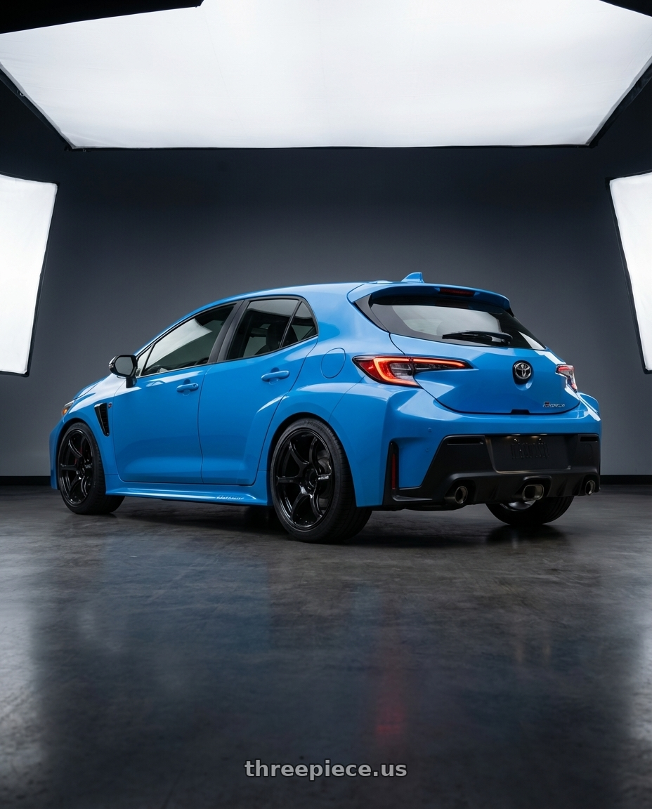 2024 Toyota GR Corolla with Advan RGIII 5x114.3 18x8.5+51 Gloss Black wheels rear three quarter view square tires