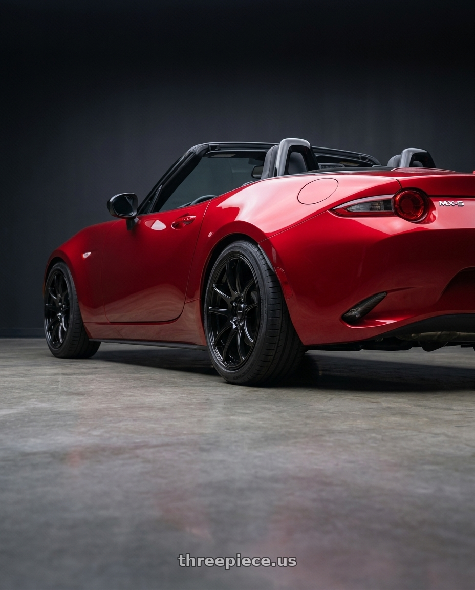2024 mazda mx5 with Vors TR4 4x100/4x114.3 17x8  +35 Gloss Black wheels rear three quarter view square tires