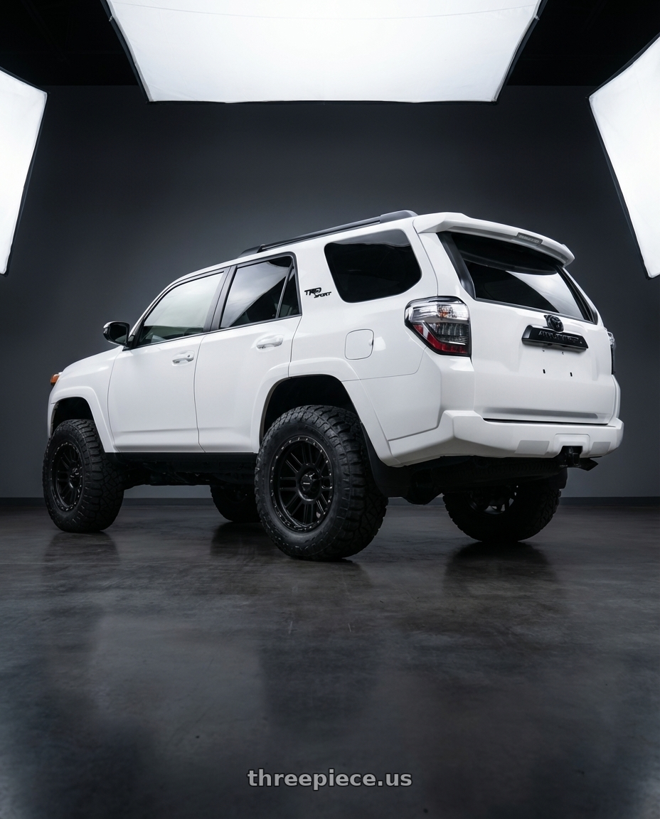 2022 Toyota 4Runner with Vision Off-Road 111 Nemesis 6x139.7 20x9+12 Matte Black wheels rear three quarter view meaty tires