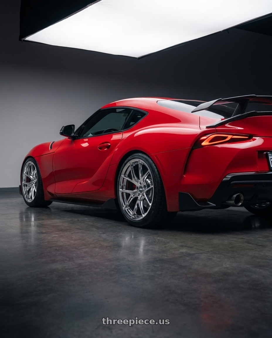 2021 Toyota supra with ESR Wheels RF2 5x112 19x9.5 +22 Chrome wheels rear three quarter view slight stretch tires