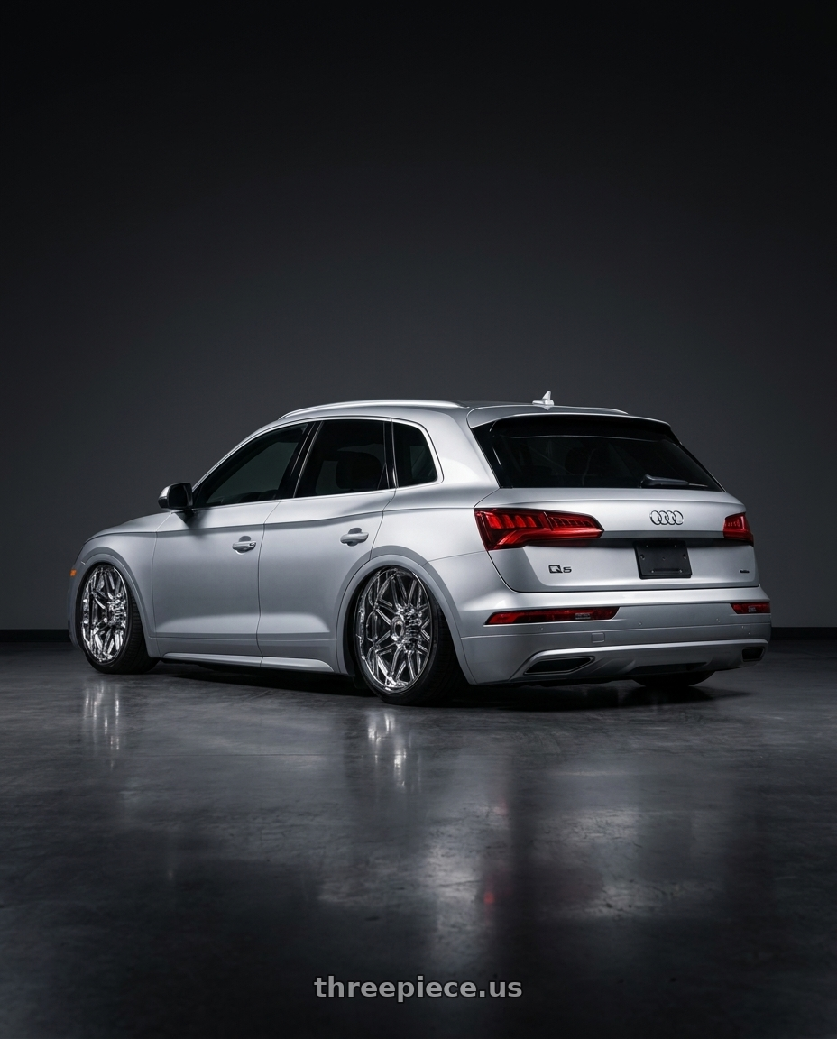 2017 Q5 20t with American Truxx Grind AT151 6X135 20X9+0 Chrome wheels rear three quarter view slight stretch tires