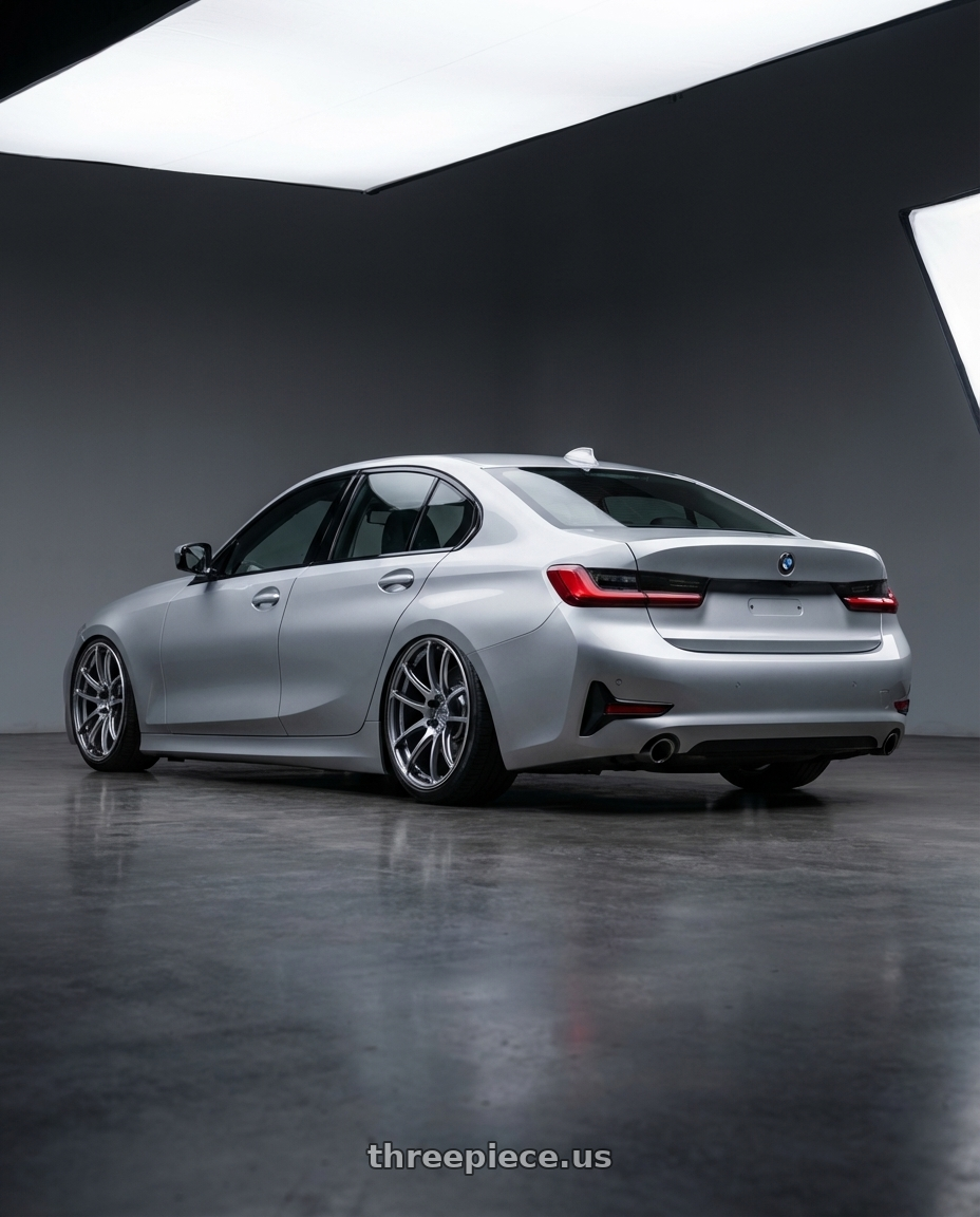 2023 BMW 3 Series G20 with Advan Racing MODEL F50 5x112 19x8.0 +48 PLATINUM BLUE COMBI wheels rear three quarter view slight stretch tires