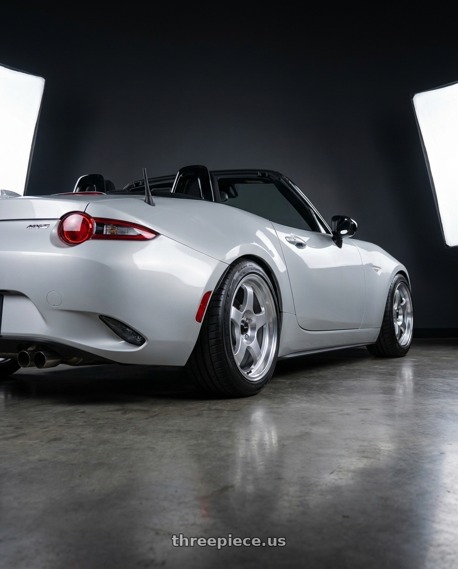2015 Mazda Mx5 with Vors SP1 4x100/4x114.3 16x7  +38 Silver Machine Face Lip wheels rear three quarter view square tires