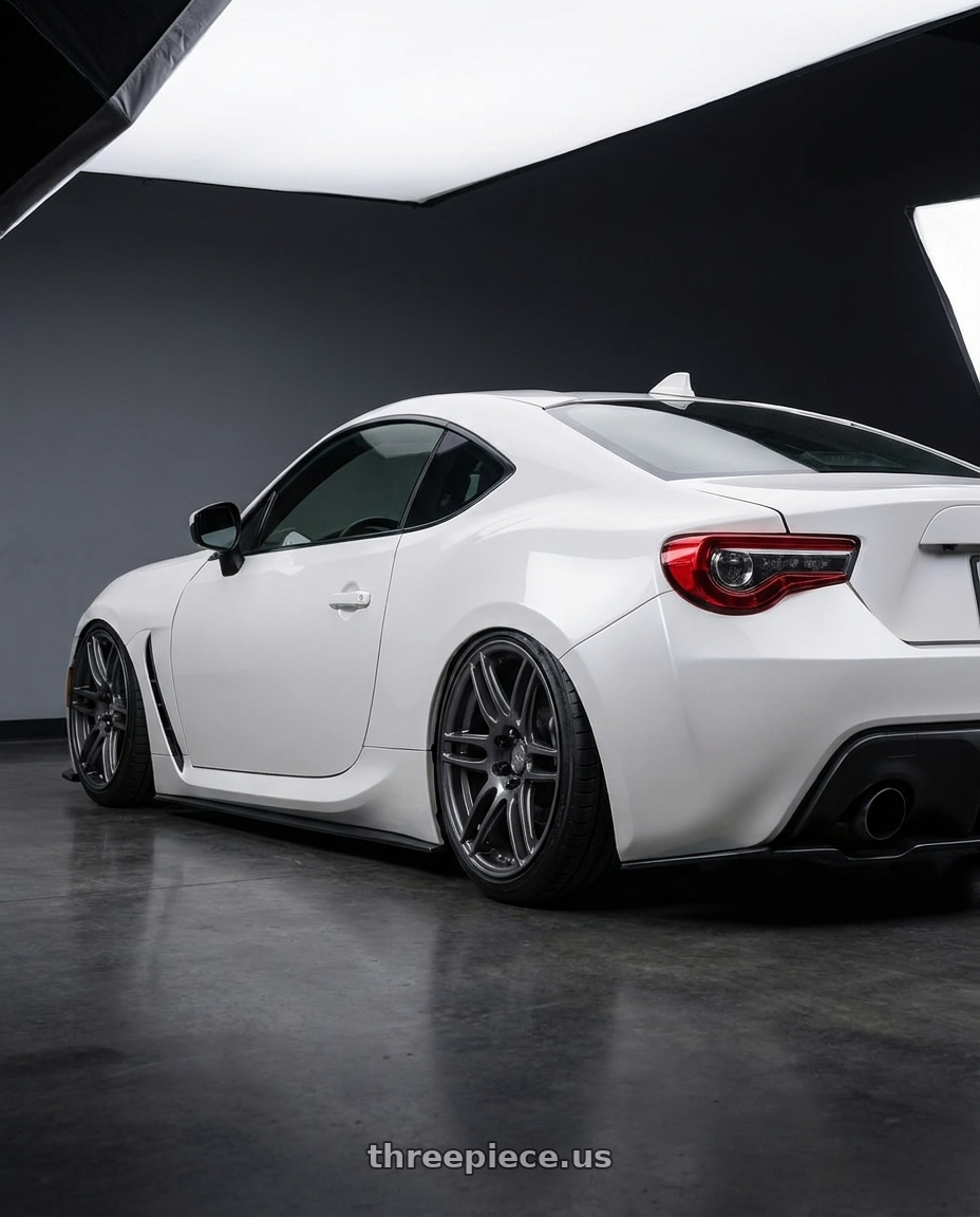 2016 Scion FR-S with Niche 1PC M105 NR6 5X100/5X114.3 18X8 +40 MATTE GUN METAL wheels rear three quarter view slight stretch tires