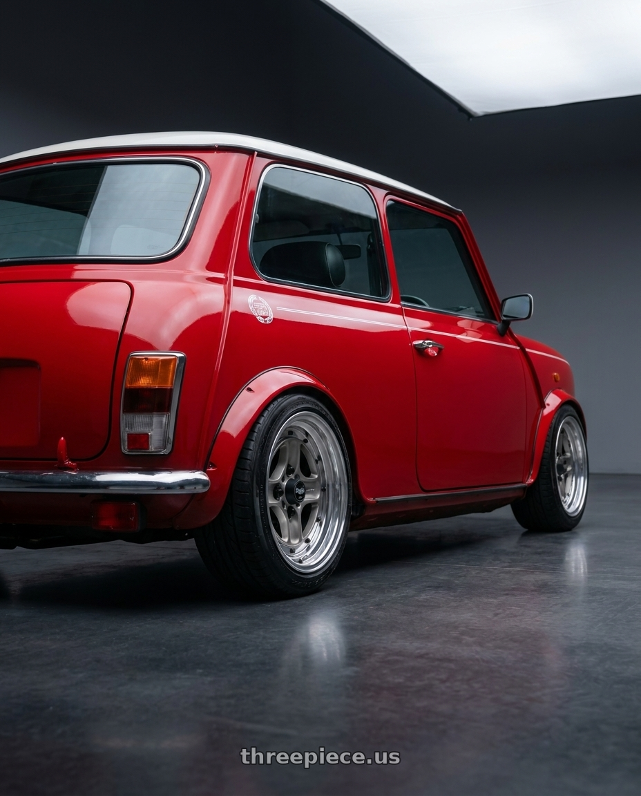 1997 mini cooper with Work Equip 40 4x100 15x5.5 +3 a disk Brut Silver wheels rear three quarter view slight stretch tires
