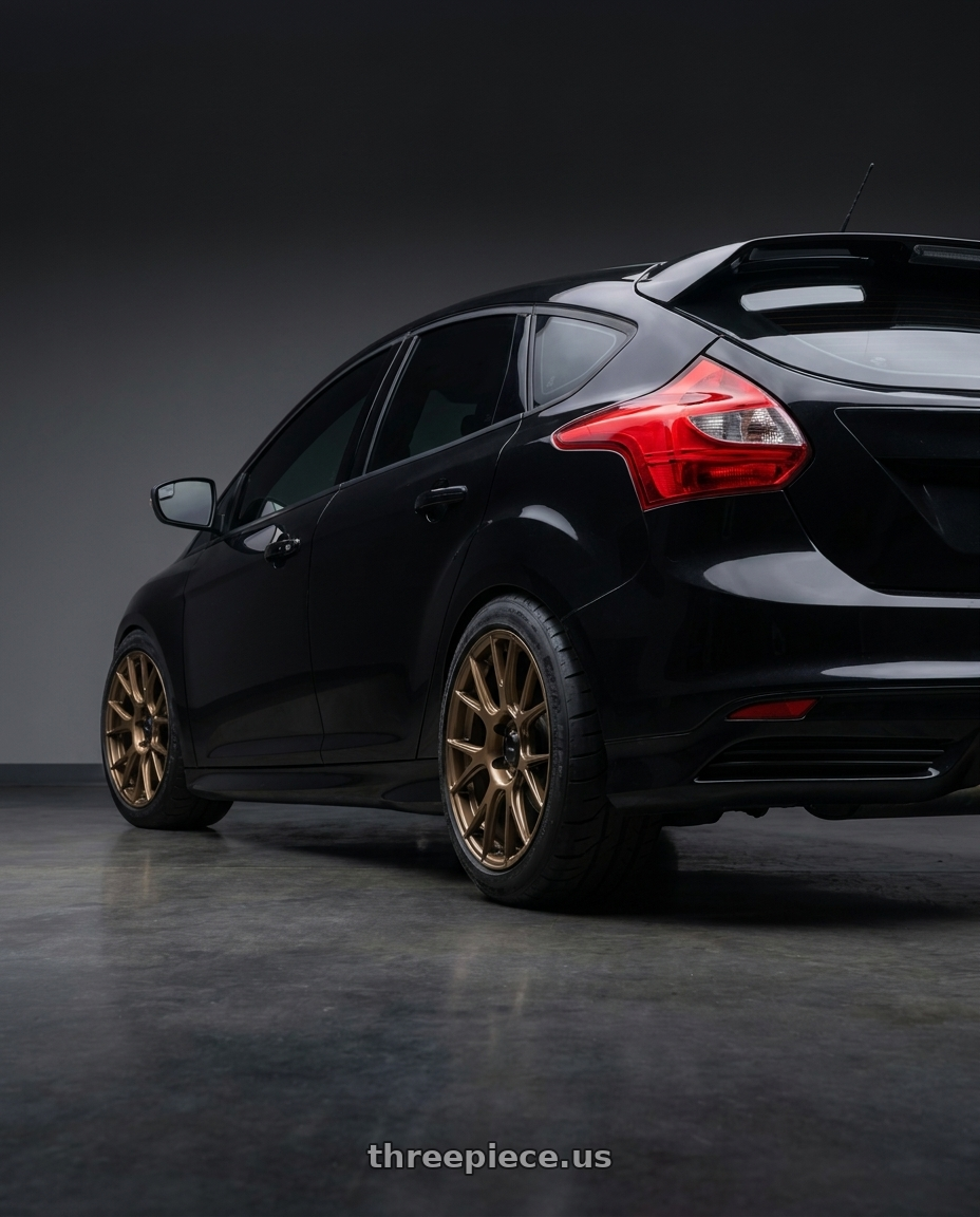 2013 ford focus st black with Konig Ampliform 5x114.3 19x9.5+35 Gloss Bronze wheels rear three quarter view meaty tires