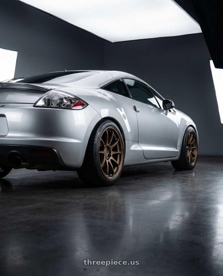 2010 Mitsubishi Eclipse with Aodhan AH09 5x114.3 18x9.5 +35 Matte Black wheels rear three quarter view square tires