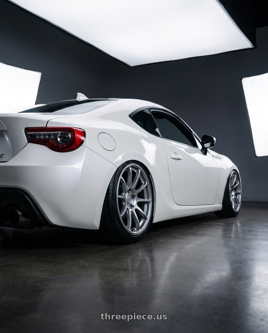 2016 Scion FR-S with Ssr Gtv02 5x100 18x8.5+44  GLARE SILVER wheels rear three quarter view slight stretch tires