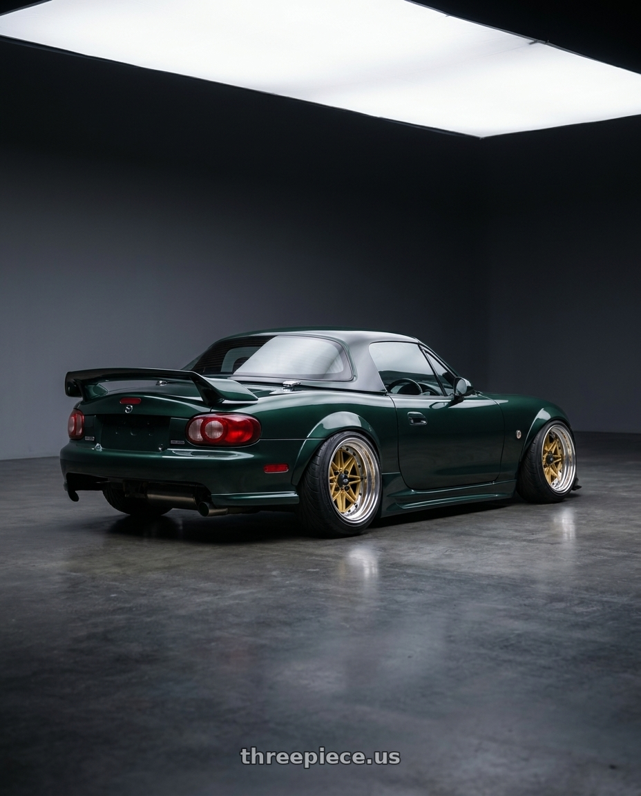 2000 Mazda Miata with EQUIP 03 GOLD 15x9.5 +1 wheels rear three quarter view extreme stretch tires