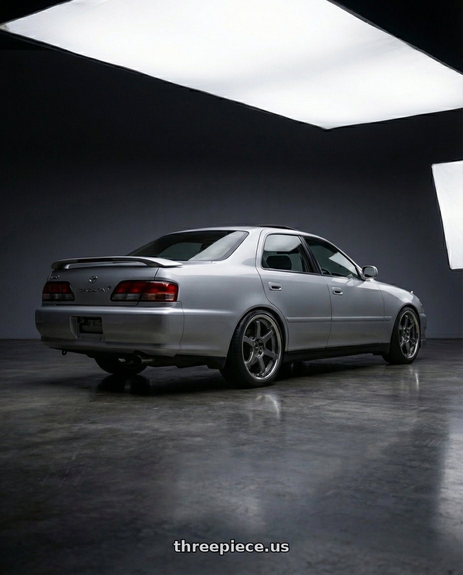 1994 Toyota Cresta Tourer V with Enkei T6R 5x114.3 17x8+40 Gloss Gunmetal wheels rear three quarter view slight stretch tires