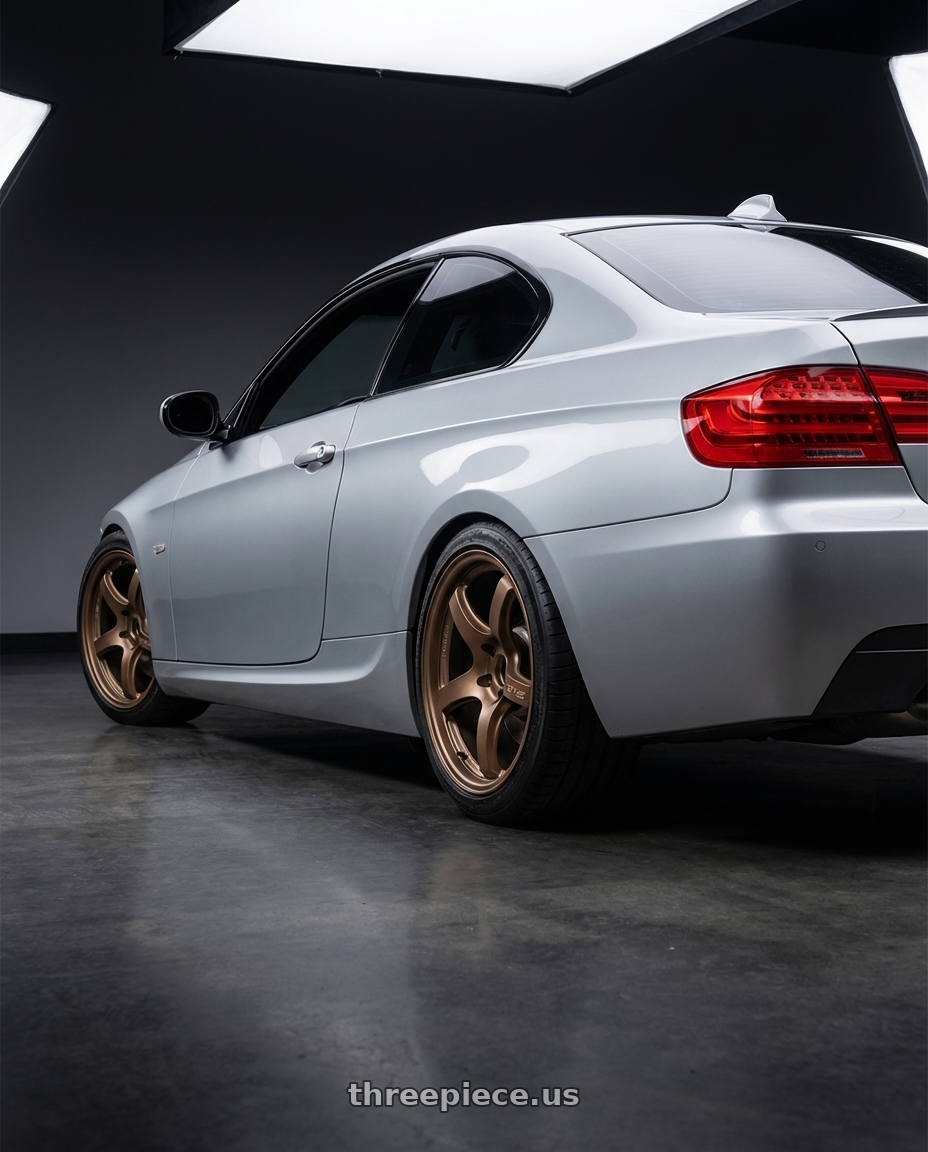 2012 BMW 3 Series E92 with Gram Lights 57CR 5x120 18x9.5+38 Bronze II wheels rear three quarter view square tires
