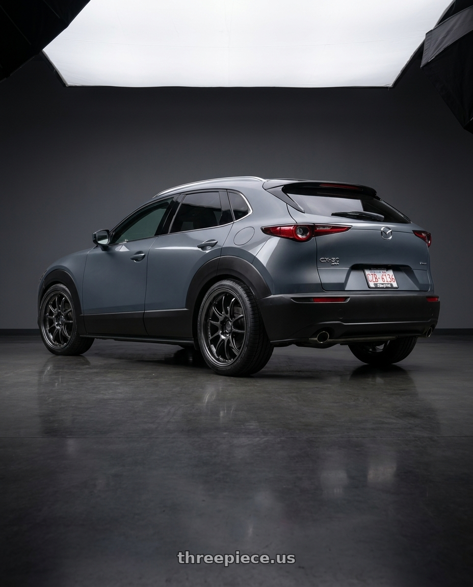 2026 mazda cx30 with Enkei PF01EVO 5x114.3 18x9.5+0 SBK wheels rear three quarter view square tires