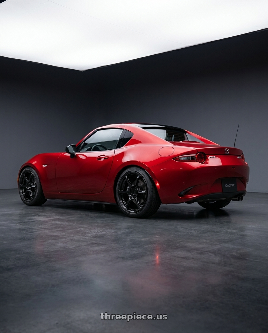 2025 mazda mx5 nd3 red with Advan RGIII 4x100 17x7.0+47 Gloss Black wheels rear three quarter view slight stretch tires