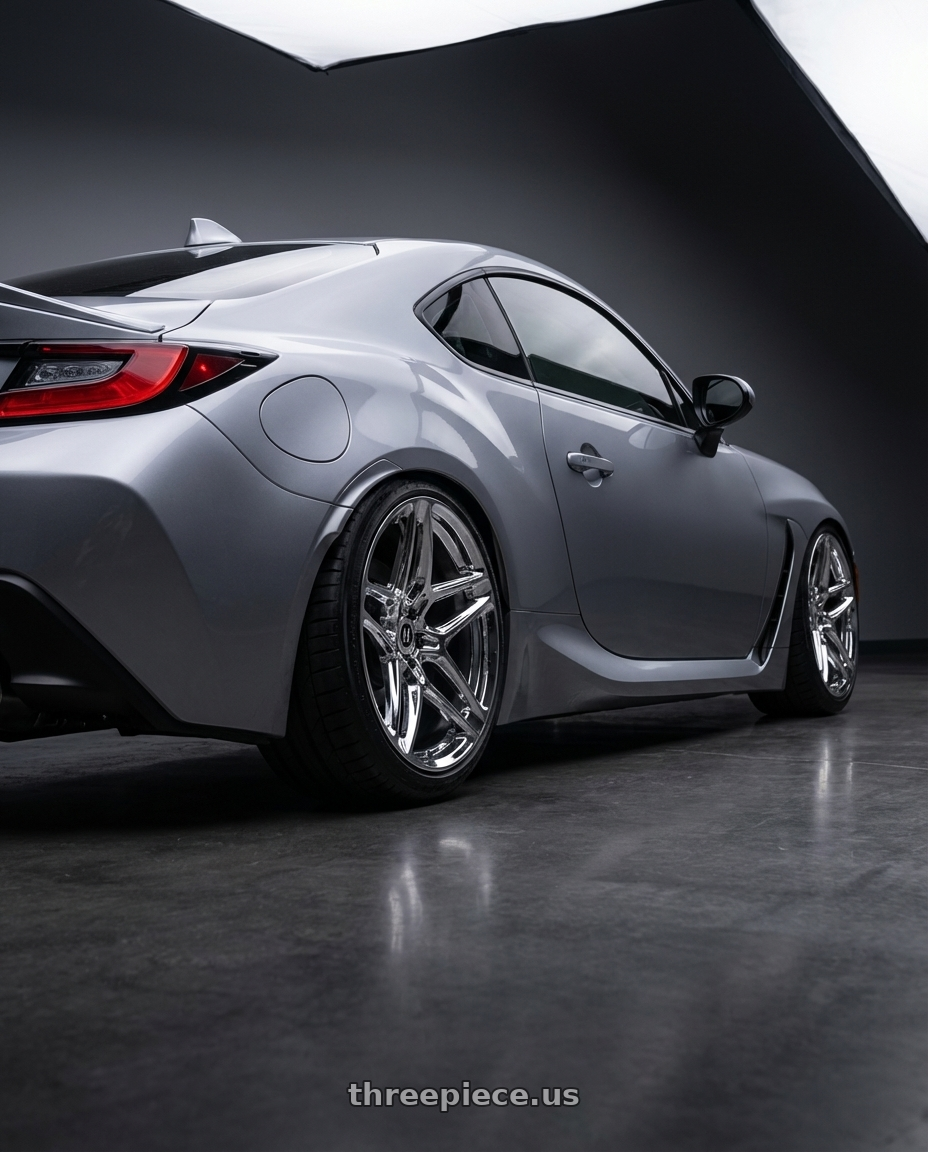 2022 Toyota Gr86 with Heritage Wheel EBISU MonoC 5x100 18x9.5+22 Chrome wheels rear three quarter view slight stretch tires