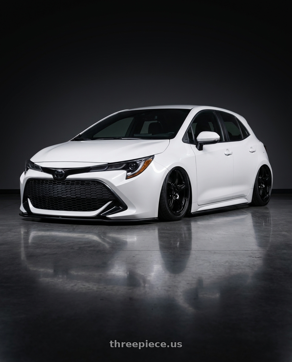 2023 Toyota Corolla Hatchback with Gram Lights 57CR 5x114.3 18x8.5+37 Glossy Black wheels