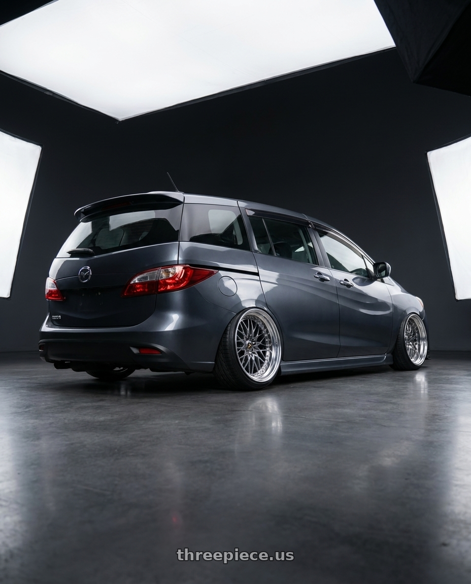 2012 Mazda 5 with Work Vs-Xv 5x100 18x10+1 A Disk Brilliant Silver Black wheels rear three quarter view extreme stretch tires