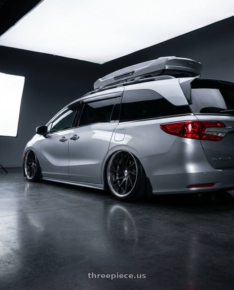 2024 Honda Odyssey with Work Gnosis Cvs 5x120 20x8+45 H Disk Matte Black wheels rear three quarter view extreme stretch tires