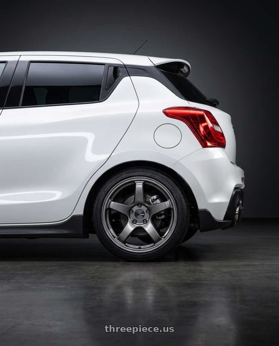 2019 Suzuki Swift sport with Enkei PF05 5x114.3 17x7+45 Dark Silver wheels rear three quarter view square tires