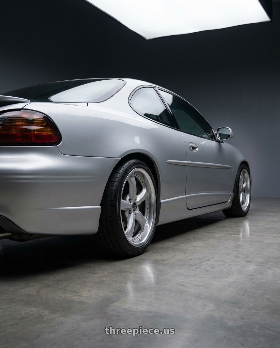 2002 Pontiac Grand prix with Work Wheels VS-KF 5x115 18x8+40 Light Grey Silver A Disk FULL REVERSE wheels rear three quarter view square tires