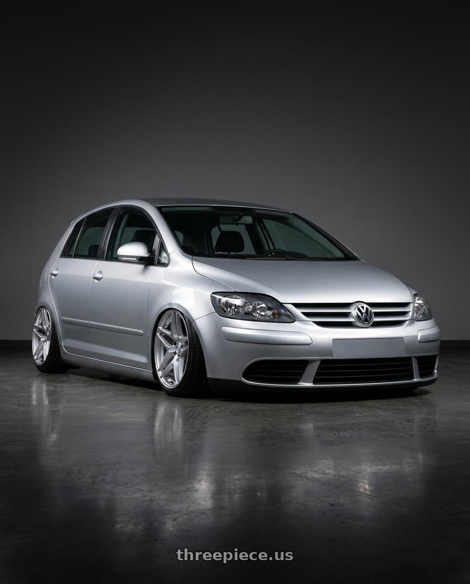 2006 Volkswagen Golf with Kansei K15H Astro 5X112 19x8.5 35 Hyper Silver wheels front three quarter view stanced stance